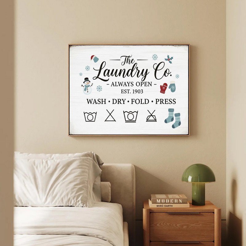 Vintage Christmas laundry room canvas wall art, chalkboard-style with snowflakes and Laundry Co. typography, horizontal