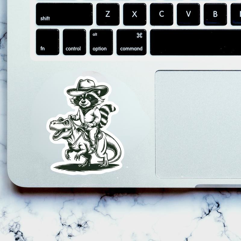 Cowboy Raccoon Riding Dinosaur Sticker